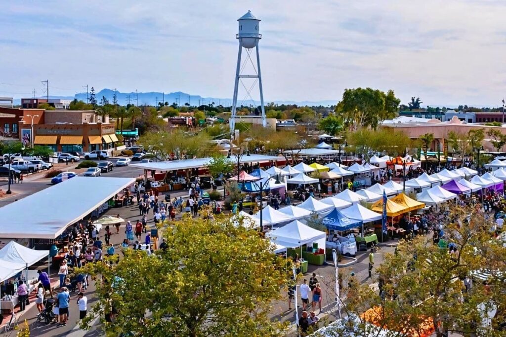 Bird's eye view of Gilbert Farmers Market vendor tents and customers