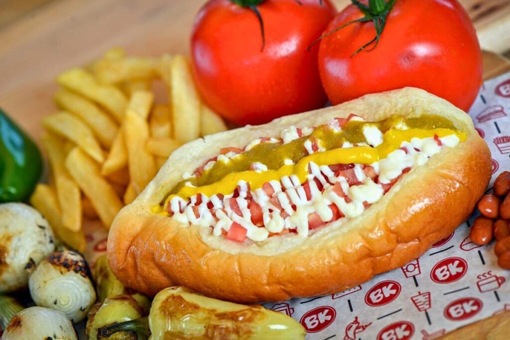 Sonoran style hot dog with fries