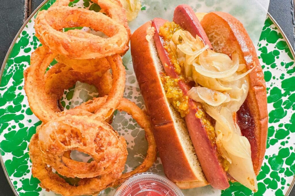 Frank's Furter Hot Dog with a side of Onion Rings