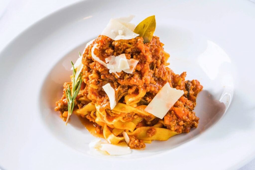 Osteria Celli fettuccine Bolognese raised on a plate