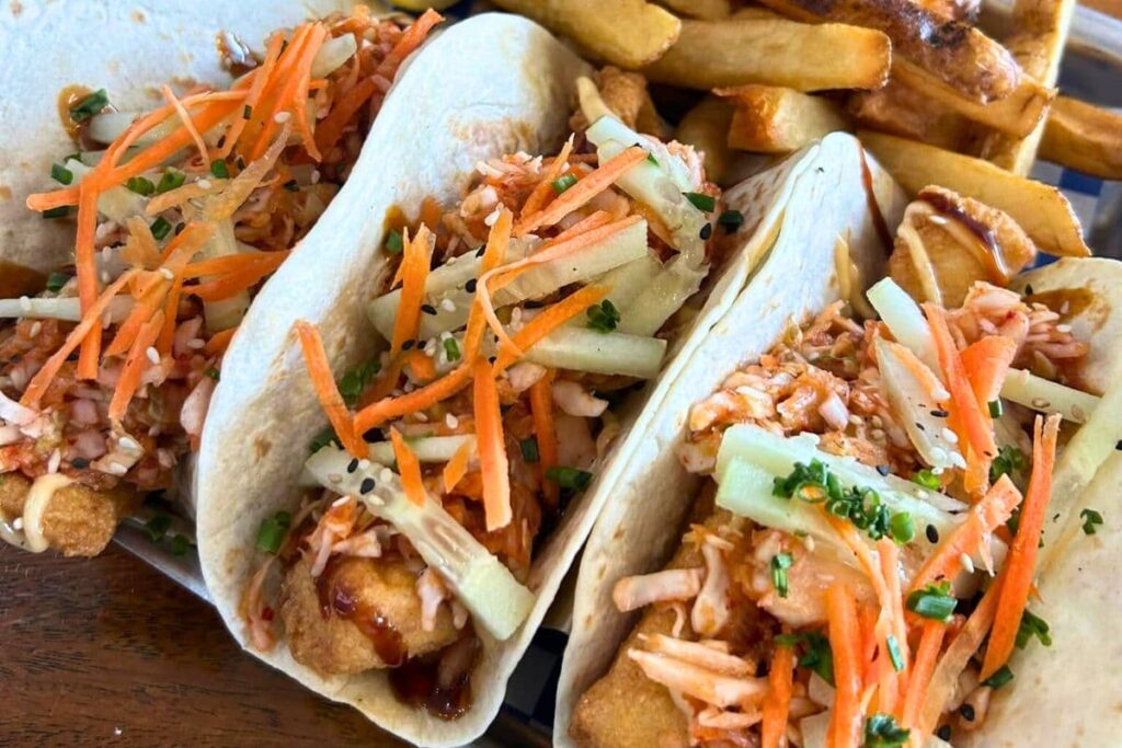 Three crispy fried cod tacos at Cape Cod Fish Company