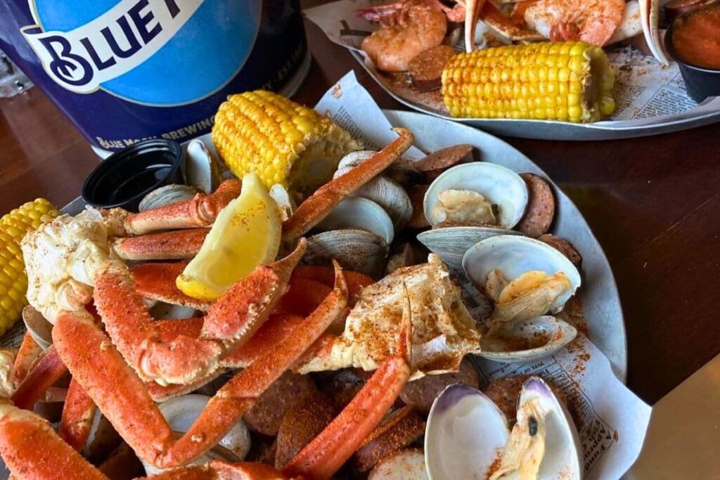 Seafood Boil with crab legs, clams, and smoked sausage